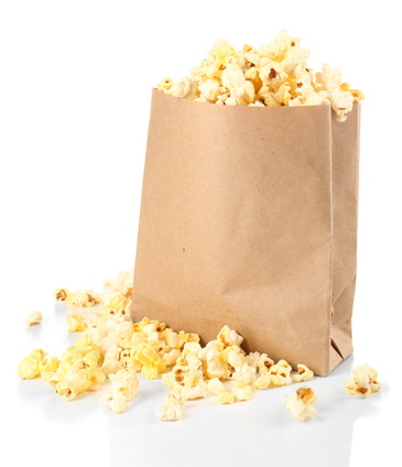 An overflowing bag of popcorn